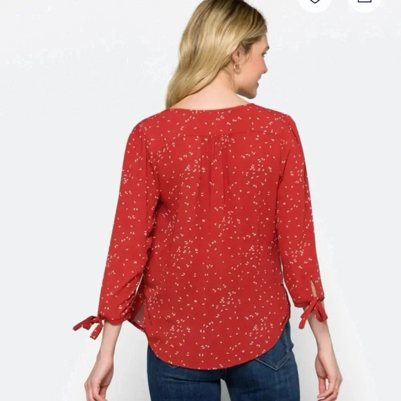 Fun2fun rust colored shirt with a cream colored design size small. - Picture 3 of 11